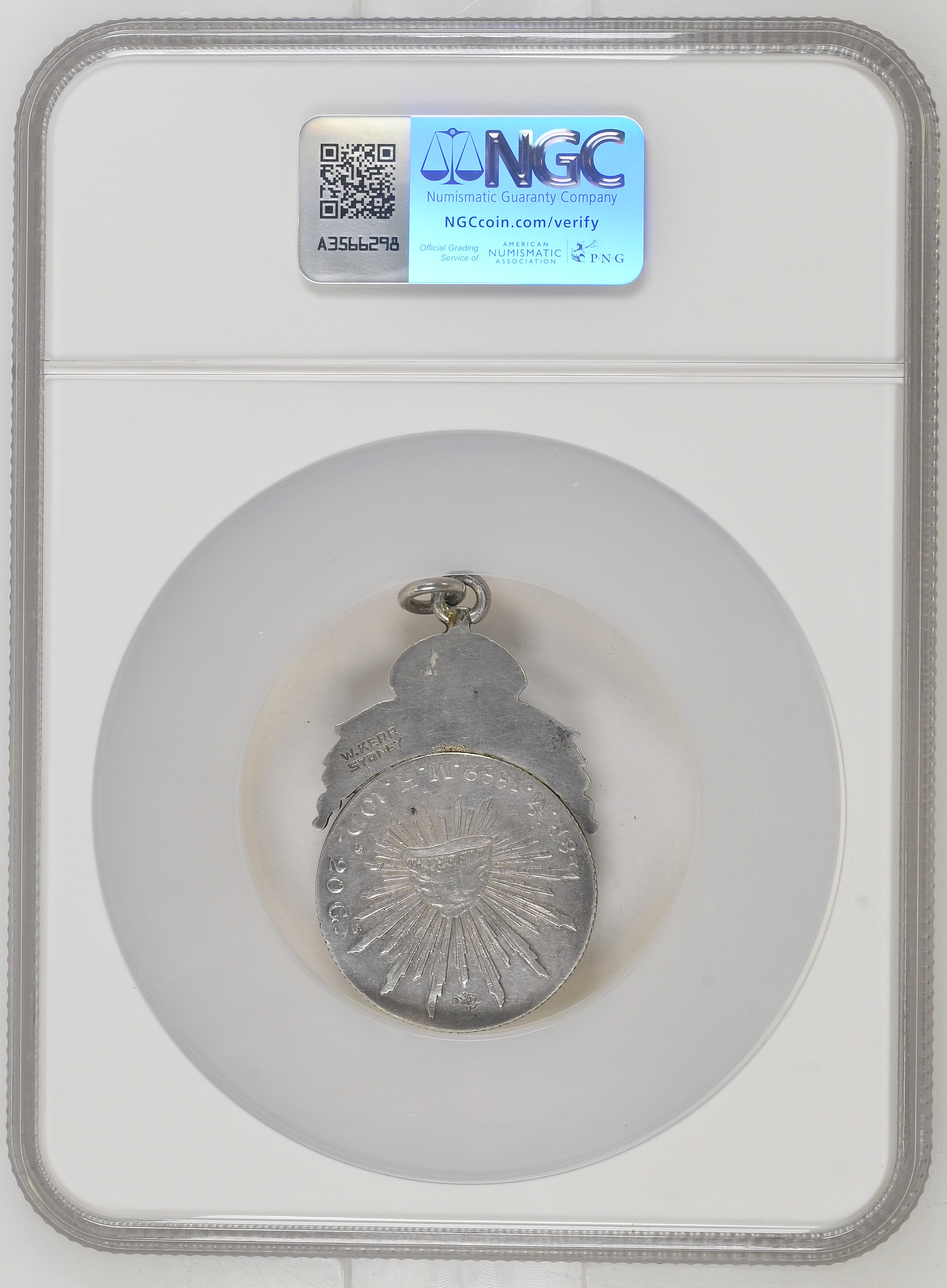 NGC holder showing the reverse of Kerr Sydney-Emden medal 2184798-001