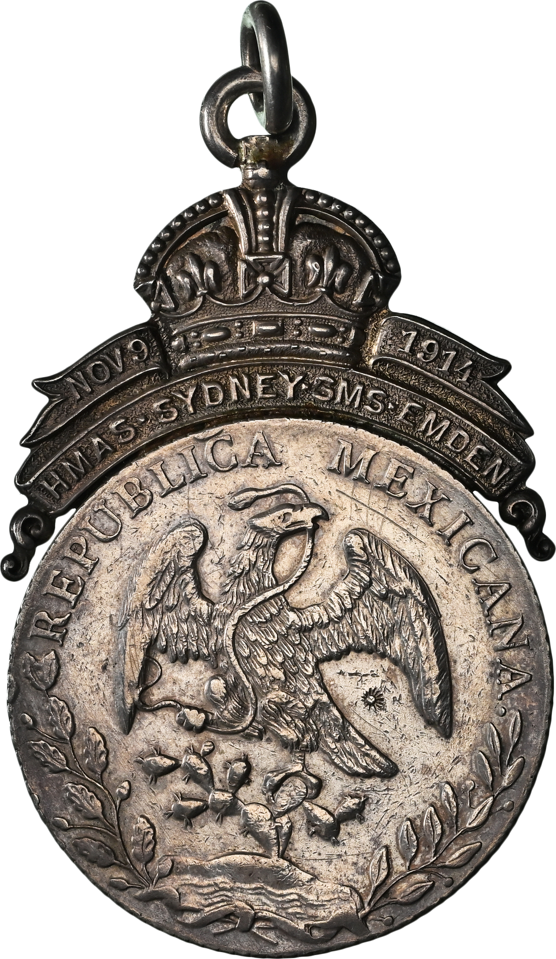Obverse of the Kerr Sydney-Emden medal made around a Mexican silver 8 Reales