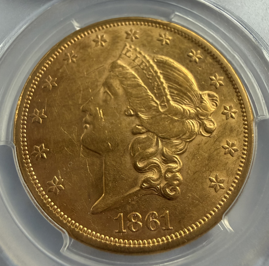 Obverse of an 1861 Liberty Head Double Eagle in a PCGS shipwreck holder
