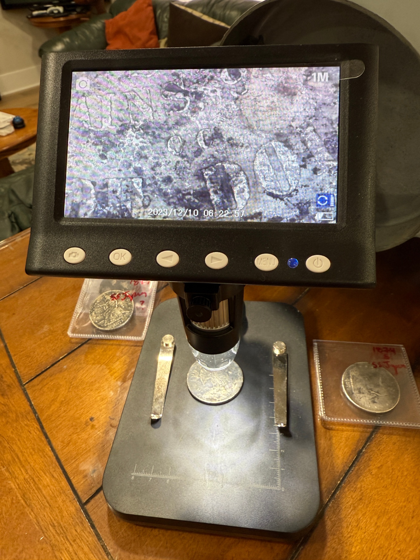 Digital microscope inspecting SS Japan Trade Dollar slabs