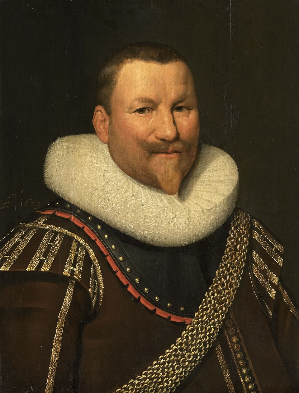 Painted portrait of Piet Pieterszoon Heyn in a white ruff and gold chain, dated 1629